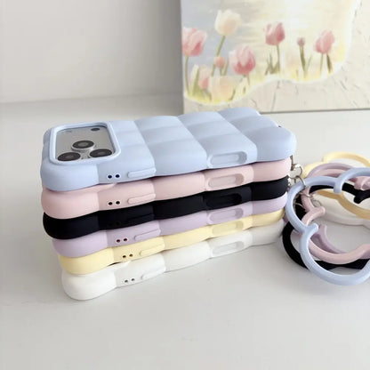 Stacked puffer silicone phone cases for iPhone 18 pro max, side view with cloud wrist rings